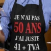 Tablier humoristique Anniversaire 50 ans TVA avec slogan drôle pour fête des 50 ans